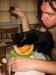 girl the cat eating cantelope.jpg - 2003:03:23 09:26:55
