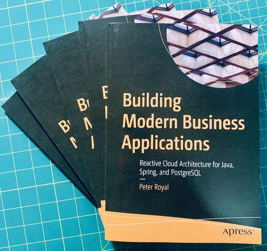 copies of my book, building modern business applications, on a table